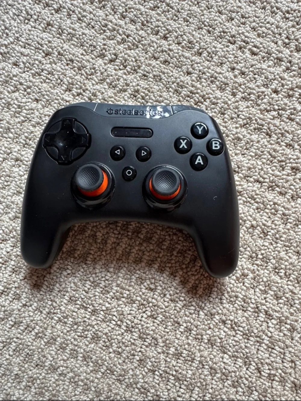 SteelSeries Black Wireless Gaming Controller with Orange Accents